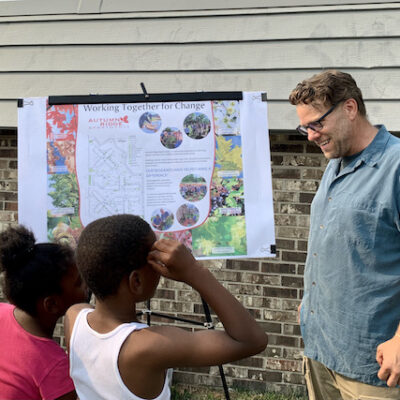 MB staff talks to kids at National Night Outevent