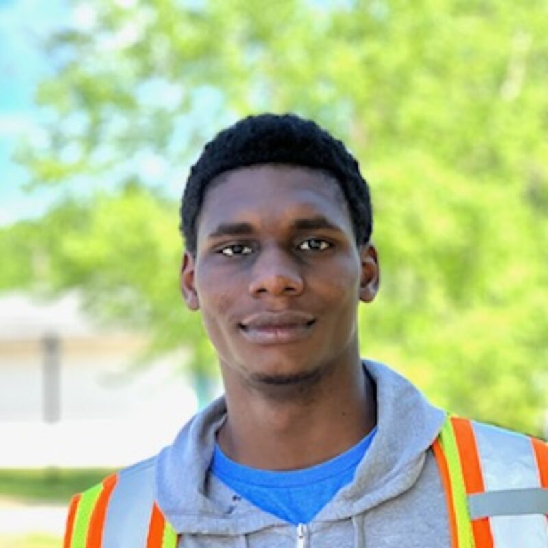 Head and shoulders young man wearing reflective vest