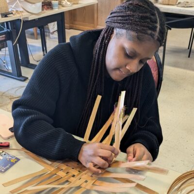 Person basket weaving